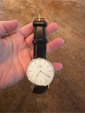 Daniel Wellington Black Leather Strap Watch with White Dial and Gold Case 36 mm.